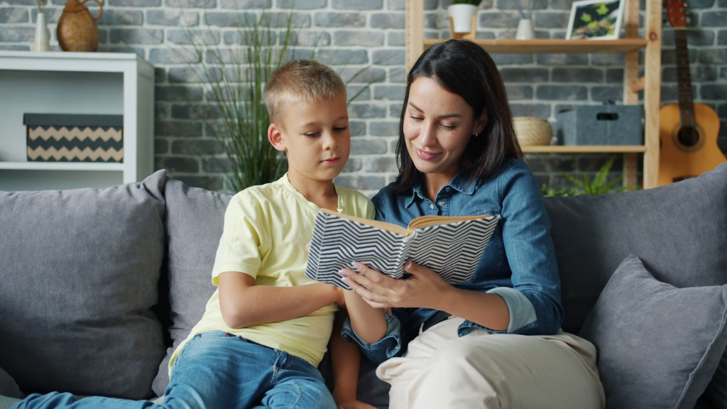 parent and child reading book together to build reading comprehension skills