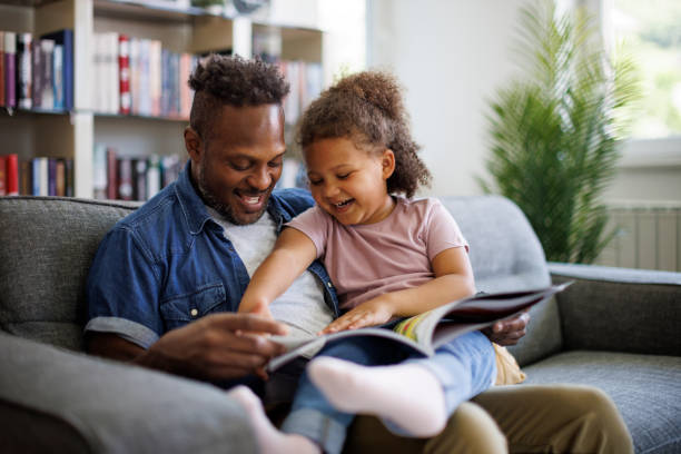 hild enjoying reading at home showing positive early literacy experience