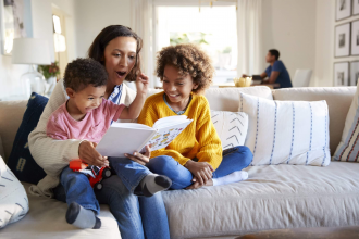 toddler asking mom to read the same book over and over at bedtime