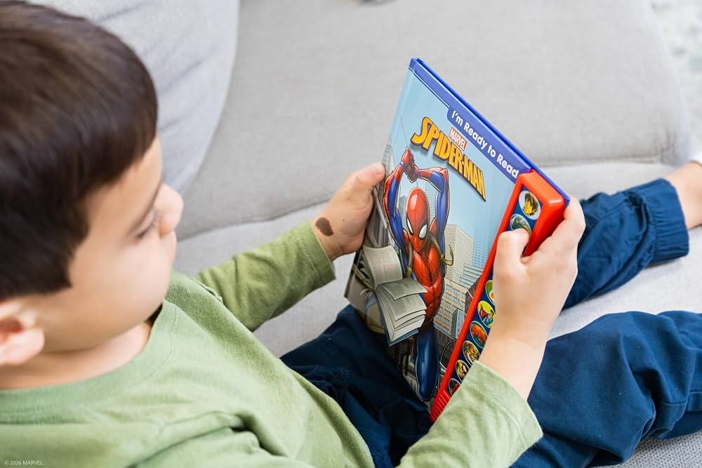 child reading an early Spider-Man book