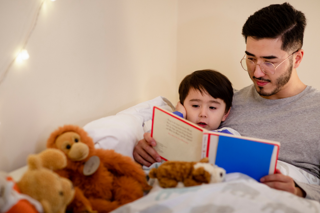 Parent helping child build a daily reading routine before bedtime