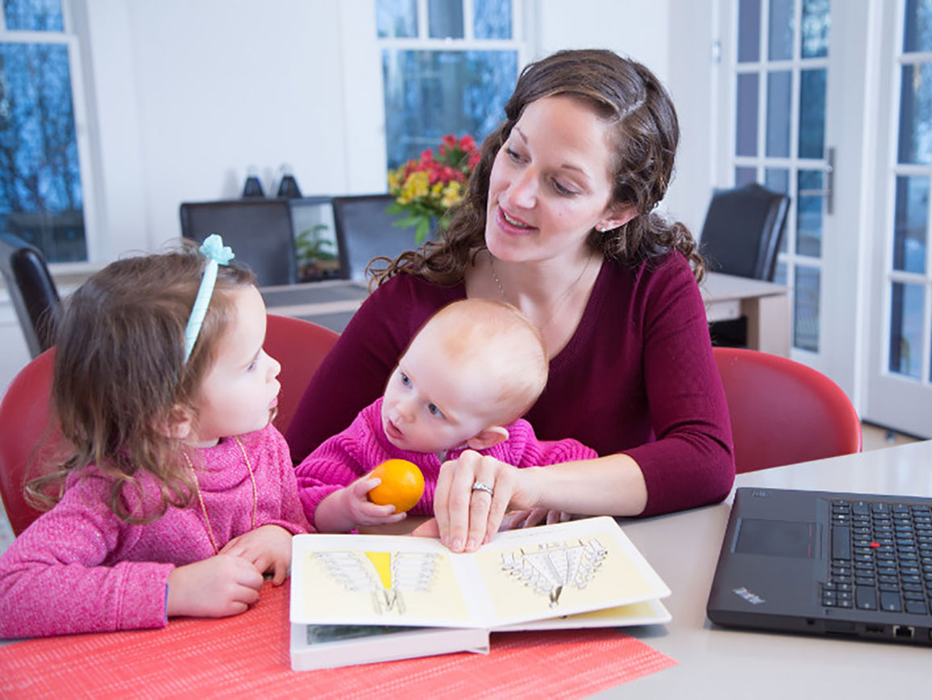 Child answering parent's reading comprehension questions for kids