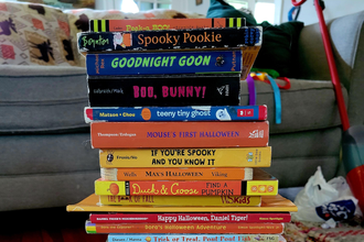 Pile of possible Halloween books for kids